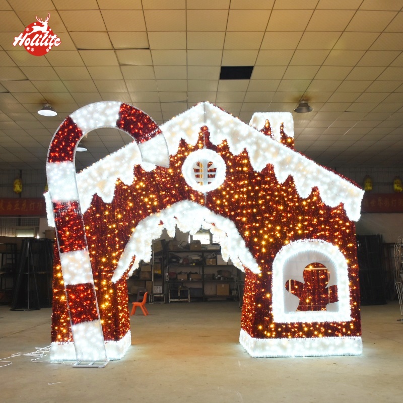 Gran casa de pan de jengibre con estructura de alambre escultura de luz de Navidad con arco de paso para la decoración del parque al aire libre
