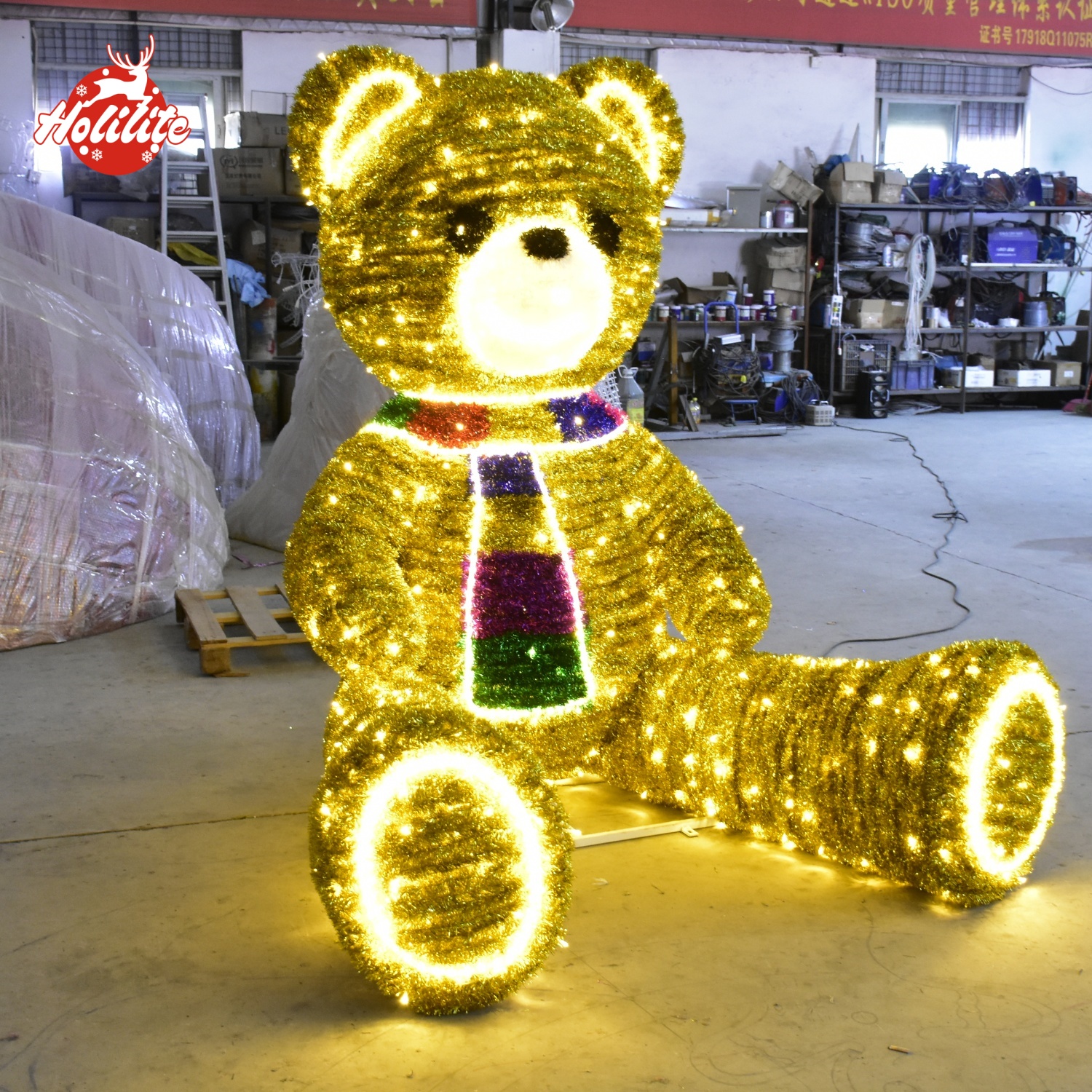 Outdoor teddy bear LED light sculpture with winter scarf