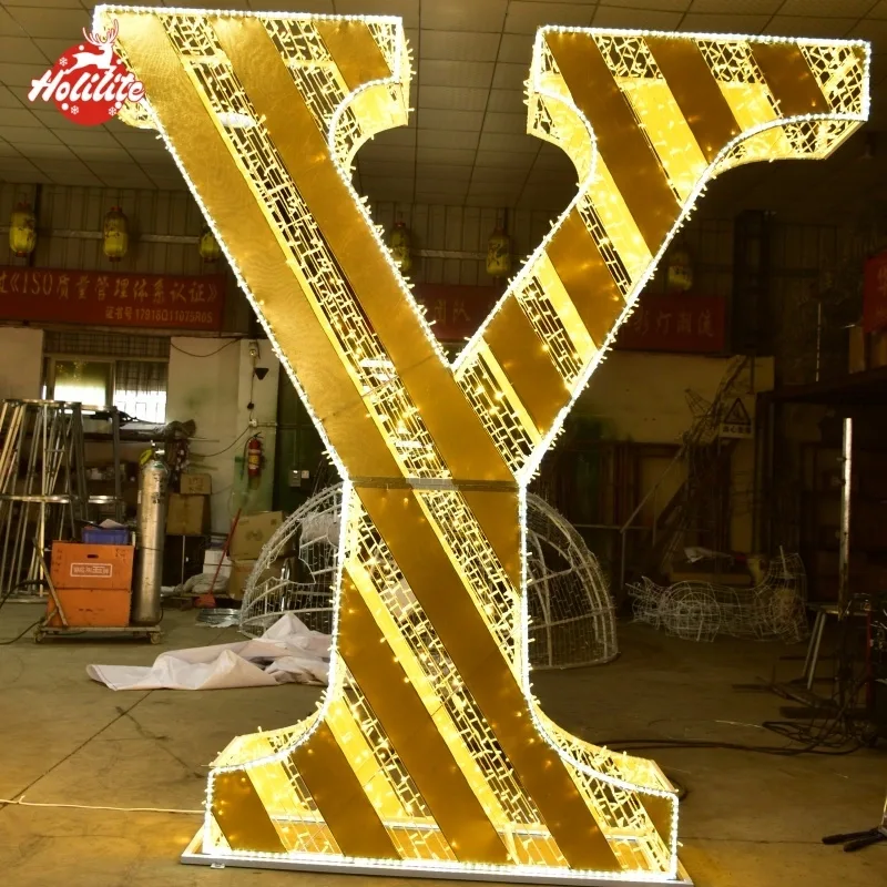 Custom illuminated JOY letters for commercial festive displays