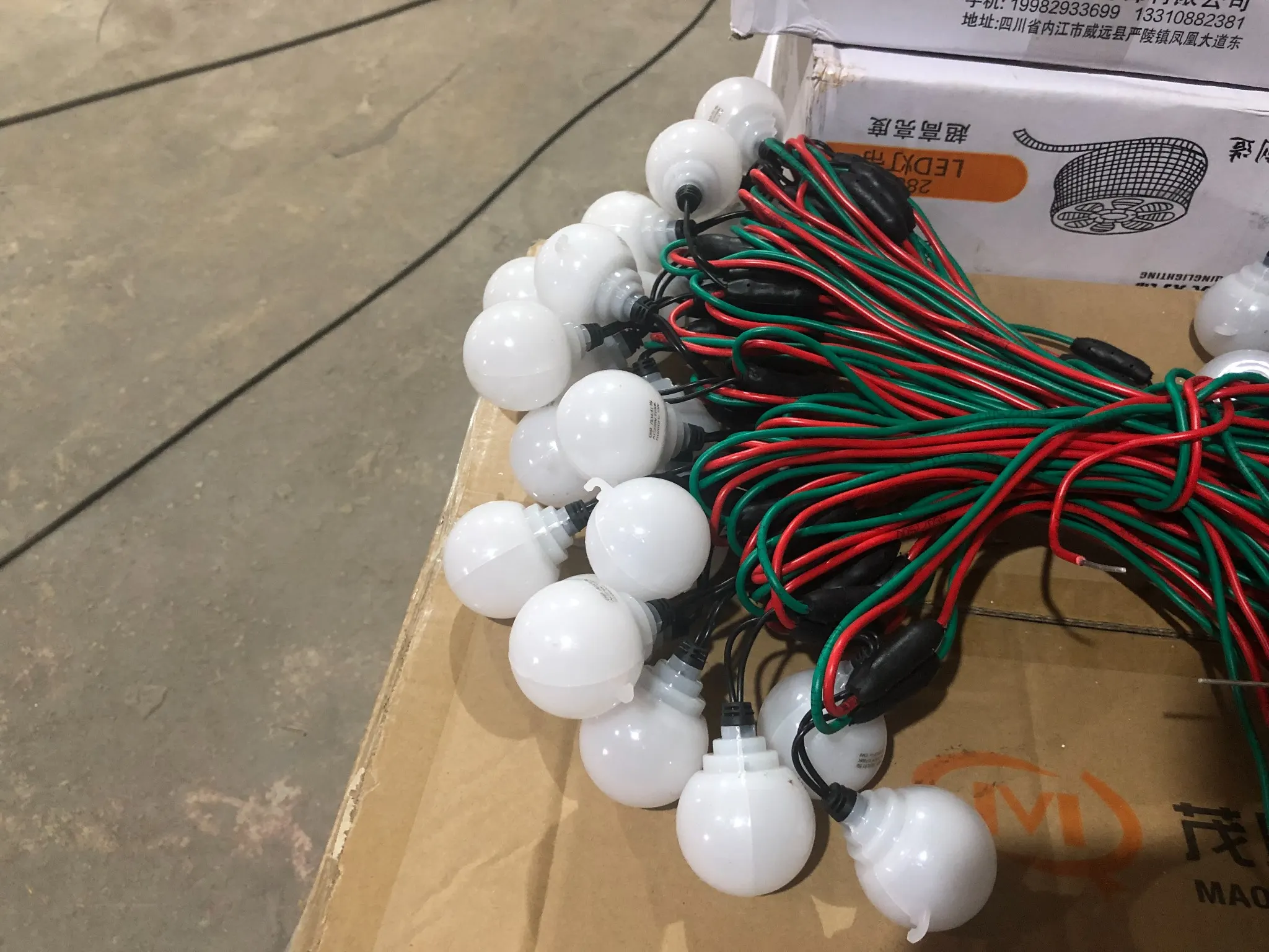 Bulb strings prepared for lighting sculpture assembly